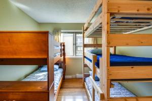 a bunk bed room with two bunk beds at Ski-In and Out and Golf Condo with A and C at Holiday Valley! in Ellicottville