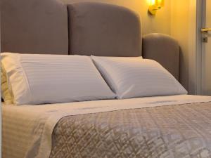Letto o letti in una camera di Ritucci Suite