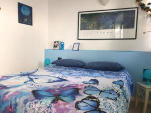Postel nebo postele na pokoji v ubytování Le Tre Arti