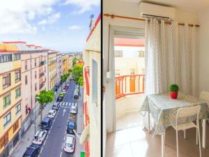 Habitación con mesa y vistas a la ciudad en Live La Laguna Heraclio, en La Laguna