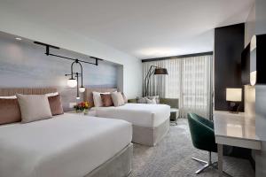 Voodi või voodid majutusasutuse Hotel 1000, LXR Hotels & Resorts toas