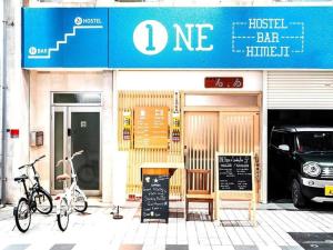 a bike parked in front of aoked bar at ONE Hostel Himeji - Vacation STAY 98707v in Himeji