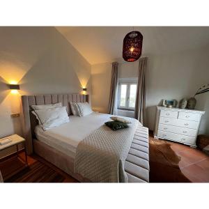 Posteľ alebo postele v izbe v ubytovaní Villa Casa Collina Castelfalfi with amazing salt waterpool & AIRCO & VIP service