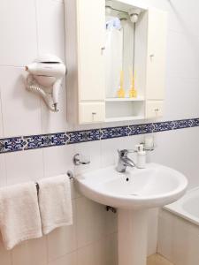 A bathroom at Puesta de Sol Rentals 2BR