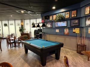 a room with a pool table in a restaurant at Travelodge by Wyndham Aberdeen in Aberdeen