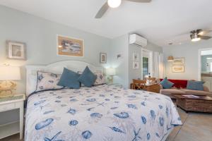 Voodi või voodid majutusasutuse An Island Getaway at Palm Tree Villas toas +181 fotot