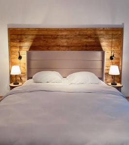 Säng eller sängar i ett rum på Traumwohnung in 1.000 Meter Höhe