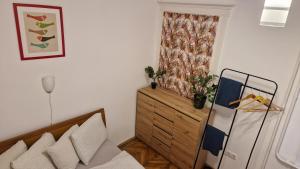 Posteľ alebo postele v izbe v ubytovaní Gellerico Rooms at Horánszky Street