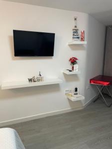 TV a/nebo společenská místnost v ubytování Loft Calypso