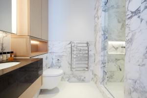 a bathroom with a toilet and a shower at Sonder King Street in London