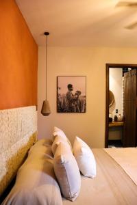 Postel nebo postele na pokoji v ubytování Hotel Boutique Gloriagave