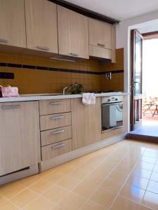 Kjøkken eller kjøkkenkrok på Art apartment Alla casa del Gastaldo
