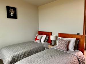 “The Cliffs” Humpridge View Motels客房内的一张或多张床位
