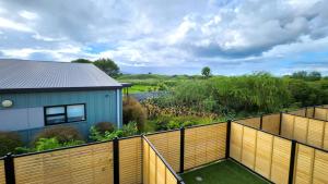 a view from the balcony of a house at U Suites on Trieste Way in Paraparaumu