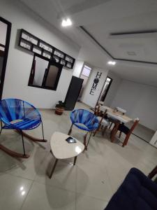 Posezení v ubytování Hermosa y acogedora casa