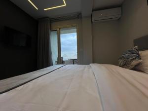Postel nebo postele na pokoji v ubytování pyramids grand museum inn