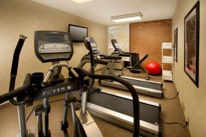 a gym with two exercise bikes and a treadmill at Drury Inn & Suites Frankenmuth in Frankenmuth