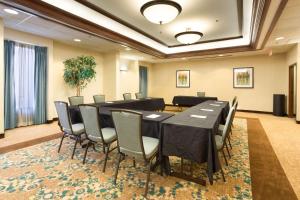 a conference room with a long table and chairs at Drury Inn & Suites Birmingham Lakeshore Drive in Birmingham