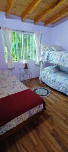 Ένα ή περισσότερα κρεβάτια σε δωμάτιο στο isla delta encantado