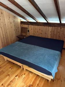Una cama o camas en una habitación de Chalet Fara Hinano, Vue Océan