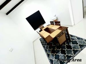 TV in/ali zabaviščno središče v nastanitvi Mstys Coastal Escape