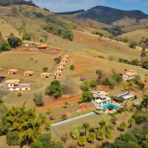 an aerial view of a small village in a mountain at Hotel Manoah in Socorro