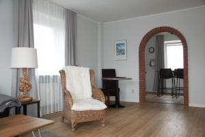 Χώρος καθιστικού στο Ferienwohnung Tidenblick
