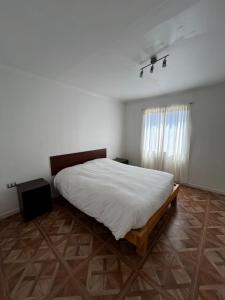 Postel nebo postele na pokoji v ubytování Hospedaje la Florentina