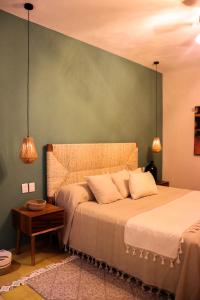 Postel nebo postele na pokoji v ubytování Hotel Boutique Gloriagave