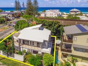 an aerial view of a house with the ocean at Currumbin Sanctuary Beach Abode in Gold Coast