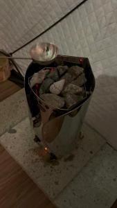 a bucket of rocks sitting on a counter in a room at ROOM龍ヶ崎 -Adult only- in Ushiku