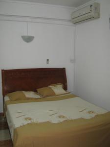 En eller flere senge i et værelse på ZZK Flats - Grand Baie Beach