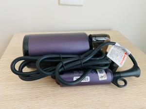 a pile of cords sitting on top of a table at 2BD @ USS & Car (Optional) in Kuching