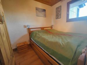 Appartement Méribel, 2 pièces, 4 personnes - FR-1-355-30にあるベッド