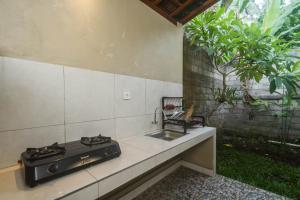 Köök või kööginurk majutusasutuses Parthi Puri Ubud