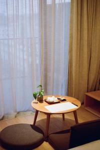 Istumisnurk majutusasutuses Taihua Wutong Hotel
