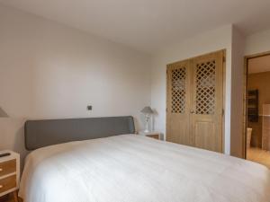 Postel nebo postele na pokoji v ubytování Appartement Valmorel, 3 pièces, 6 personnes - FR-1-356-383