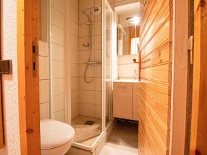 a bathroom with a shower and a toilet and a sink at Appartement Valmorel, 3 pièces, 6 personnes - FR-1-356-395 in Valmorel