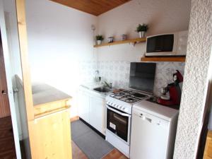 Køkken eller tekøkken på Appartement Chamrousse, 3 pièces, 8 personnes - FR-1-340-273