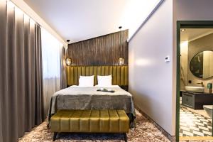 Ugandi Hotel客房内的一张或多张床位