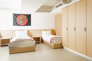 Postel nebo postele na pokoji v ubytování Tropical Low Boundary B&B