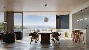 Posezení v ubytování Moonrise & Starfall - twin Wategos luxury retreats