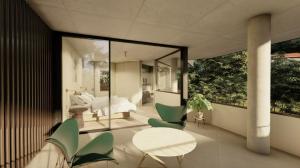 Posezení v ubytování Moonrise & Starfall - twin Wategos luxury retreats