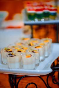 a tray filled with appetizers on a table at Grand Rockland Hotel in Matara