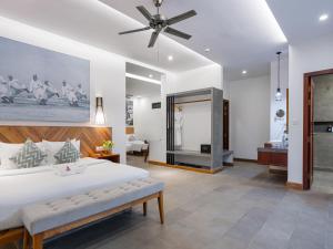 Postel nebo postele na pokoji v ubytování Grand Yard La Residence