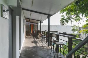 En balkong eller terrass på Tropical Low Boundary B&B