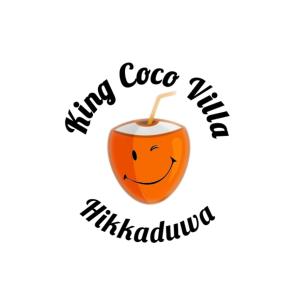 Una taza de café con una carita sonriente en King Coco Villa Hikkaduwa, en Galle