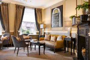 Svetainės erdvė apgyvendinimo įstaigoje Trinity Townhouse Hotel