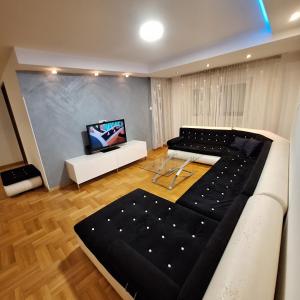 Et tv og/eller underholdning på Luks apartment + 46 billeder