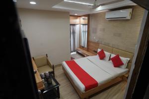 Hotel Gokul客房内的一张或多张床位